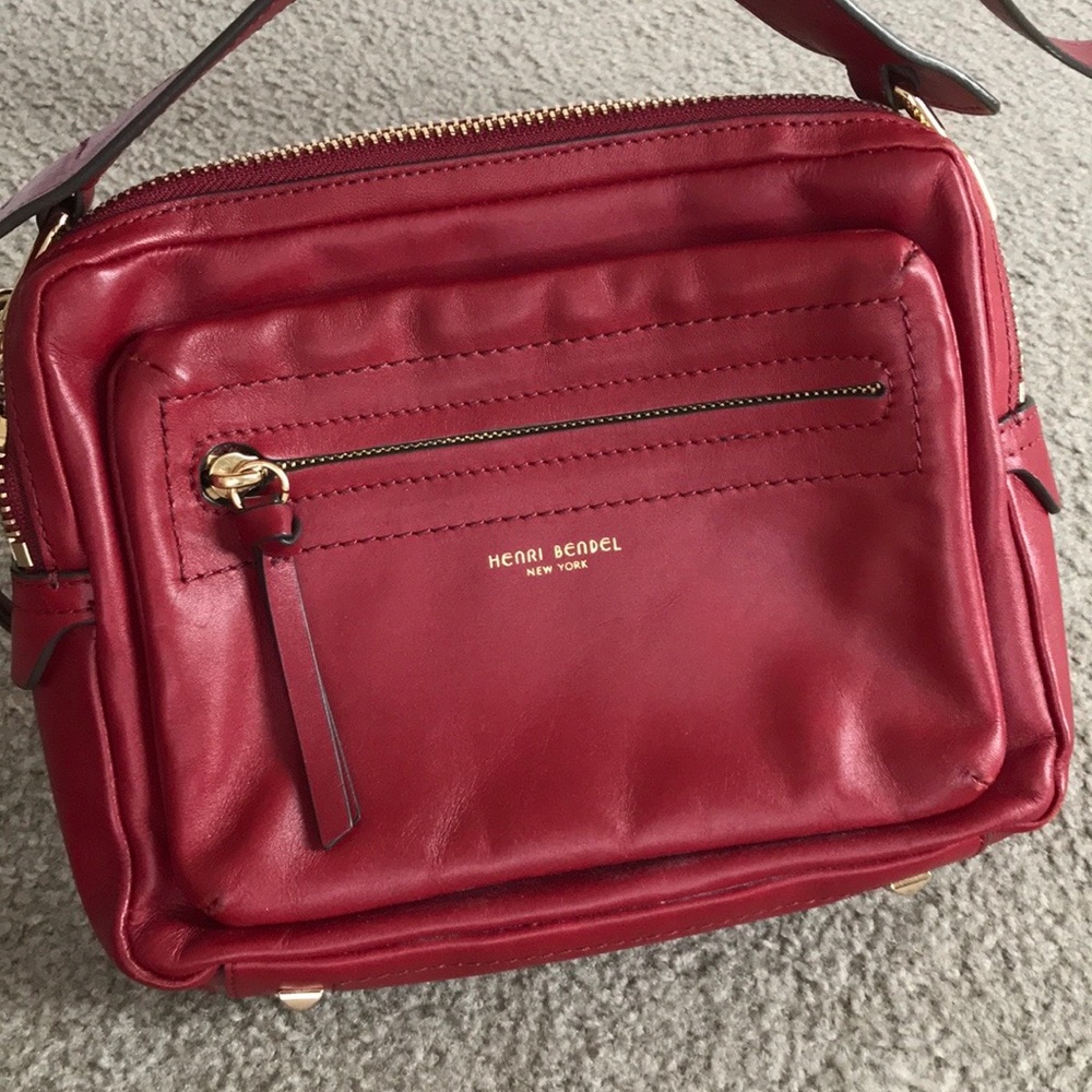 Red Henri bendel designer crossbody handbag.